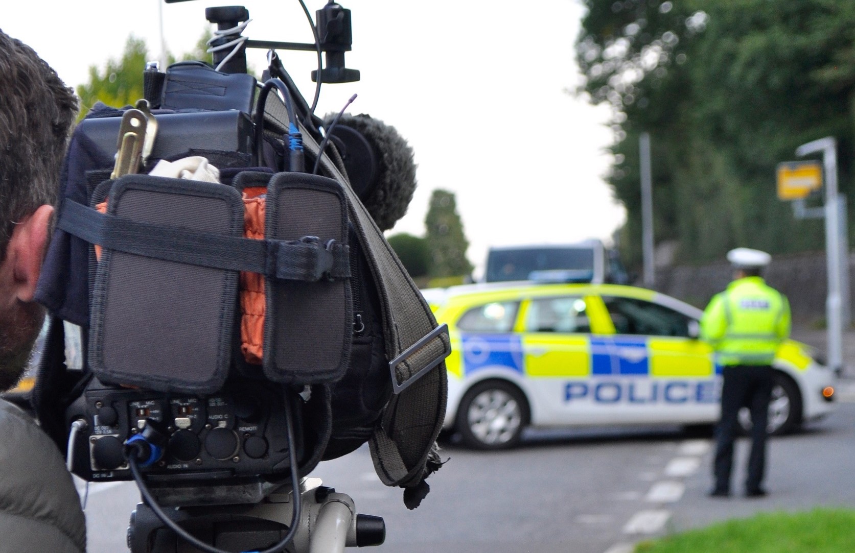 Police car speed camera filming